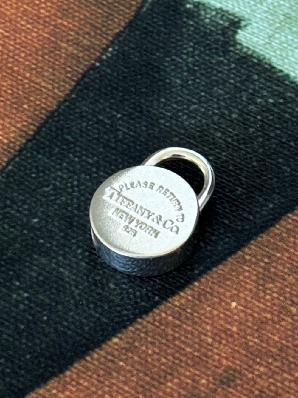Tiffany & Co. Return to Tiffany Sterling Silver Round Padlock Charm Pendant